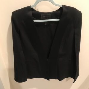 Winter cape with satin collar for a polished look!